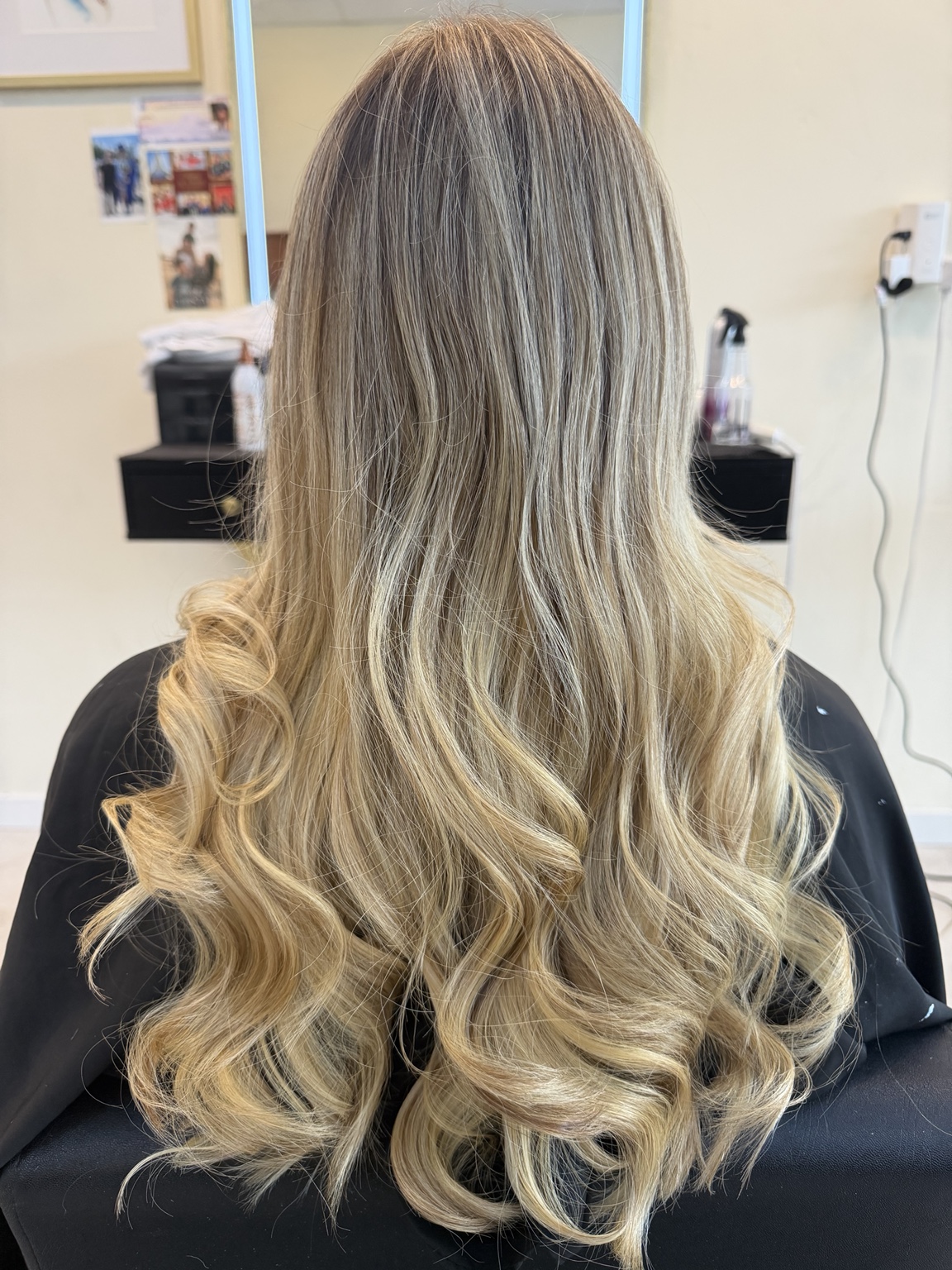 Long dimensional blonde waves styled at Hana and Co